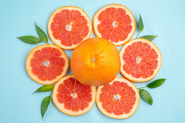 top view fresh grapefruits fruit slices on the blue background fruit fresh color juice citrus