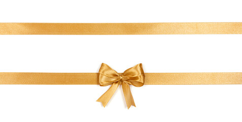 Golden satin ribbon with a bow isolated on white background. Decoration concept.