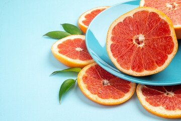 front view fresh grapefruits fruit slices on blue background fresh color citrus fruits juice