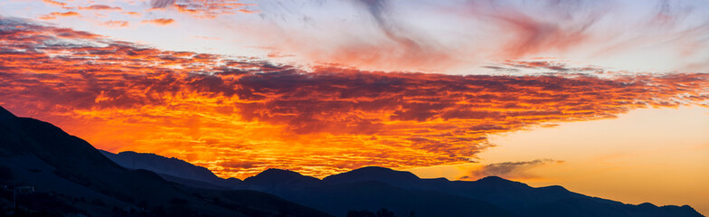 Panorama Sunset, Sunrise over Silhouetted Mountains 