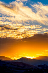 Sunset in mountains, clouds, sky, silhouette
