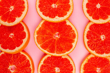 top view tasty grapefruits sliced juicy fruits on light pink background healthy life juice fresh color diet