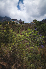 View up to steep overgrown mountain with the village of Santa Cruz la Laguna, Guatemala