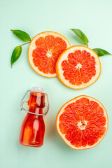 top view tasty grapefruits sliced juicy on light-blue background diet color fresh healthy life juice fruits