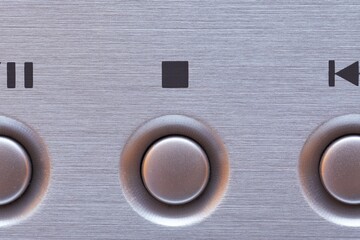 CD player buttons closeup, stop button in the middle