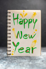 front view happy new year writing on notepad on grey background photo xmas holiday color new year