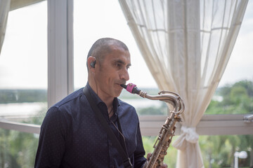 man playing the saxophone