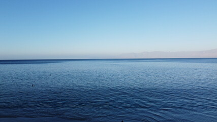 Obraz premium atardecer vuelo drone oceano chile