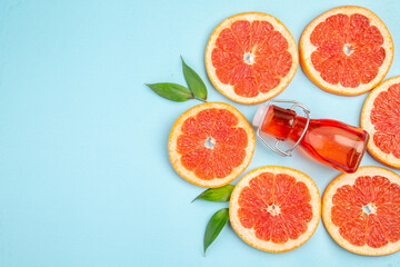 top view fresh grapefruits fruit slices on blue background juice fruit color citrus fresh free place