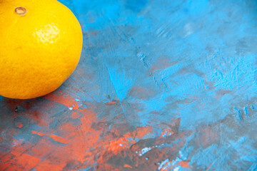 front view fresh tangerine on blue background orange color citrus fruit photo juice