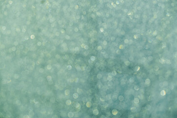 Blurred abstract glitter texture.