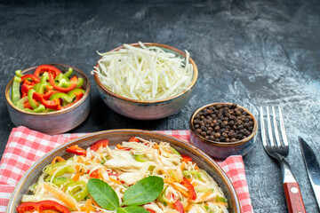 front view tasty vegetable salad with sliced cabbage and bell-peppers on grey background meal color photo diet