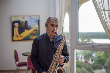 person playing saxophone