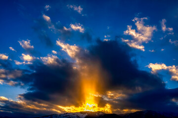 Fototapeta na wymiar Sky at Sunset with Rays of Light Horizon