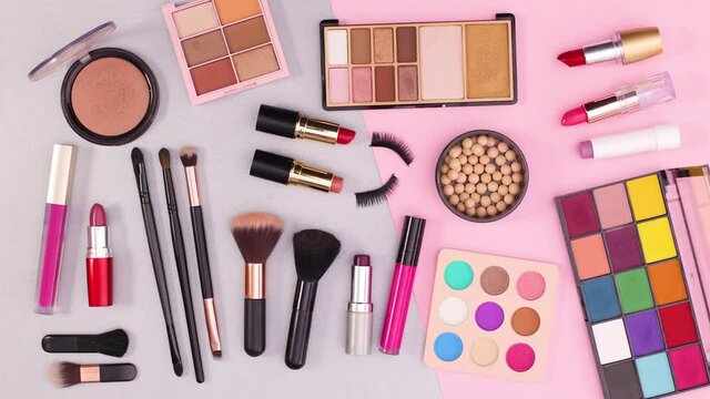 Make up beauty products move on silver pink theme. Stop motion