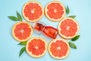 top view fresh grapefruits fruit slices on blue background juice fruit color citrus fresh