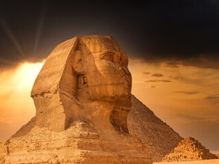 Fototapeta na wymiar The Great Sphinx Of Giza And The Pyramids In Egypt