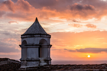 old tower with sunset