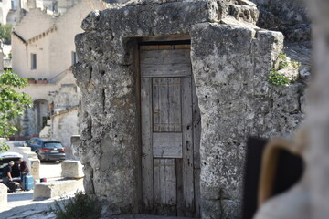 Antique wooden door and stone