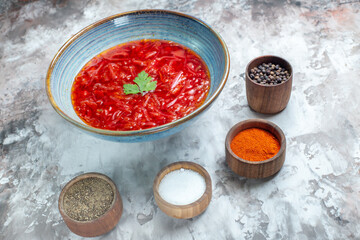 front view tasty borsch ukrainian beet soup with seasonings on the white background photo cuisine dish meal color