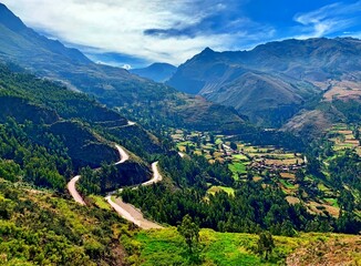 Fototapeta na wymiar Winding roads to Sacred Valley Incas Urubamba in Andes mountains Peru. Idyllic peaceful nature at summer season. Spectacular Peruvian landscape in Cuzco region.