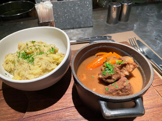 Boeuf Bourguignon, beef stew with red wine, mushrooms, bacon, truffle mash potato served in a cocotte
