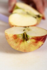 Cutting Apples into Quarters. Making Apple Tarte Tatin with Cinnamon Series.
