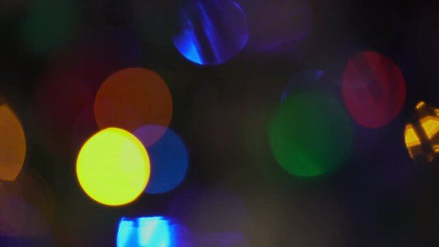 Coloured Christmas tree lights out of focus bokeh