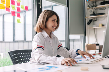 Designer woman planning application for mobile phone. UX UI designer concept.