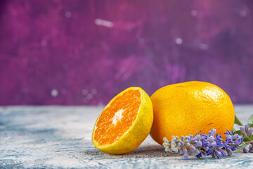 front view fresh tangerine slice on pink-blue background fruit citrus photo juice color