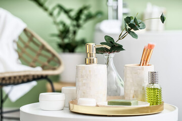 Body care cosmetics on table in bathroom