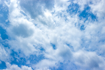 Blue sky and white clouds in day time.