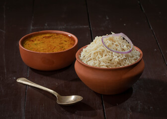 Indian Cuisine Jeera Rice With Dal Tadka Also Know As Cumin Rice on Vintage Wooden Background