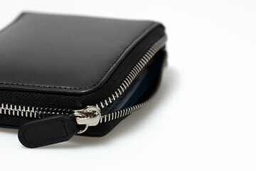 Closeup mens wallet black leather zipper pouch isolated on white background