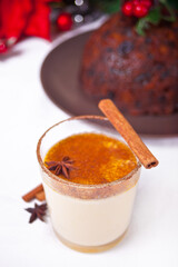 Glass of holiday egg nog on the celebration table