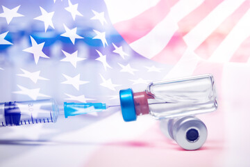 USA Vaccination, Coronavirus, USA flag, Vaccine vial dose, needle syringe, concept vaccination