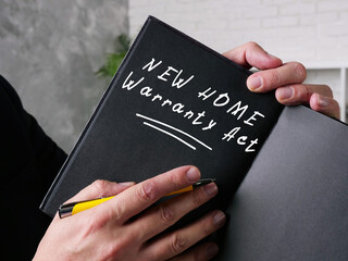 Conceptual photo about NEW HOME Warranty Act with handwritten phrase.