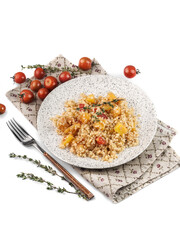 food photography of diet dish, boiled bulgur side view with baked pumpkin, tomatoes and herbs on white background isolated close up