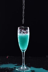 glass of green water 