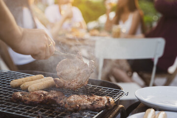 Asian people party drinking beer and barbecue grill