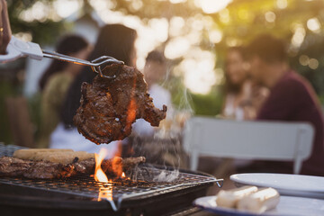 Asian people party drinking beer and barbecue grill