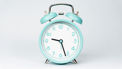Alarm clock 09.27 o'clock isolated on white background.