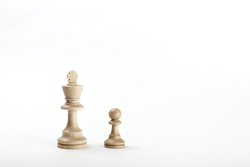 king and pawn on white background