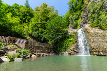 Waterfall mountain landscape. Place for relaxation and connecting with nature