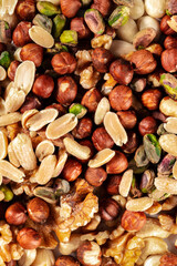 Healthy vegan snacks concept. Many different nuts, shot from the top