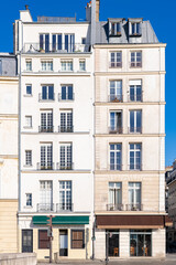 Fototapeta premium Paris, beautiful narrow facades quai d’Orleans, on the ile Saint-Louis.
