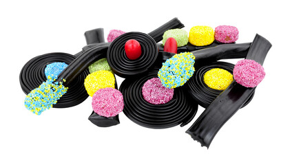 Group of novelty liquorice sweets including Catherine wheels, spinning tops and traffic lights isolated on a white background
