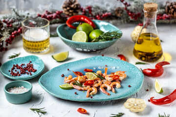 Shrimps, Prawns. Fresh seafood shrimp with lime, rosemary, chili on a blue plate, Seafood. Boiled prawns