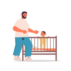 young father playing with little son in crib fatherhood concept dad spending time with his kid full length vector illustration