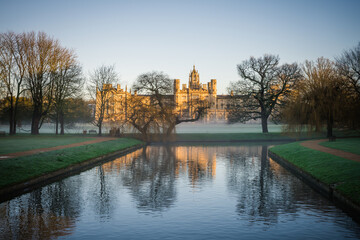 St. John's building near river cam in morning light. Cambridge city.  England 